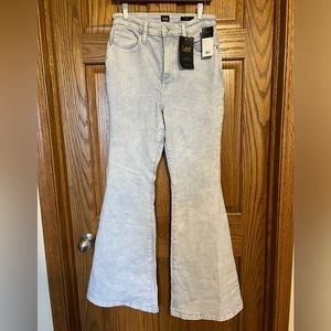 Lee brand flare jeans. Size 30/30. Never worn, with tags on. Smoke free home.